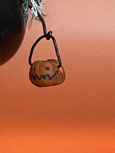 A Witch with Pumpkin Bucket